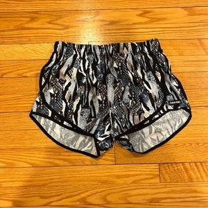 Calvin Klein Size Small Women’s athletic shorts animal print (with pockets).